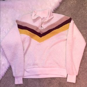 a fuzzy white sweater